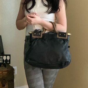 NEW CHARLES DAVID PURSE